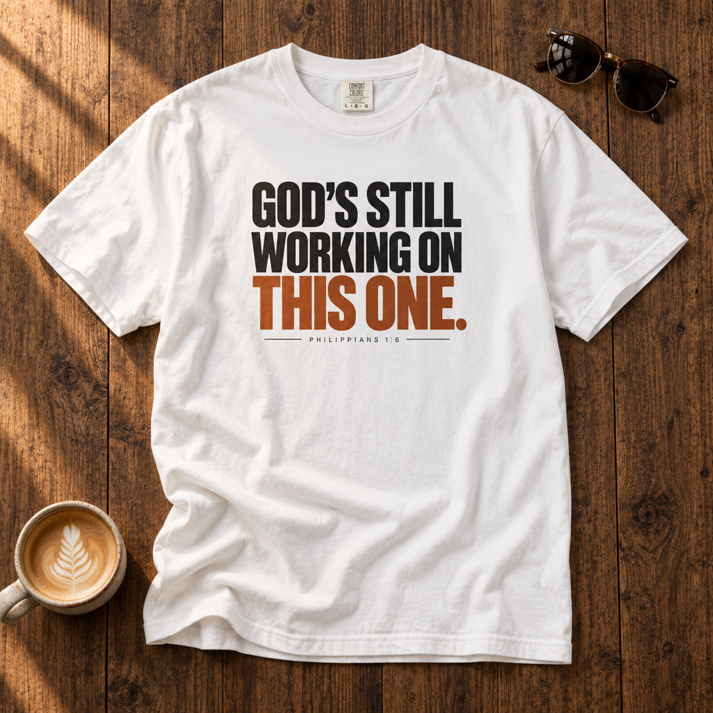 God’s Still Working Tee