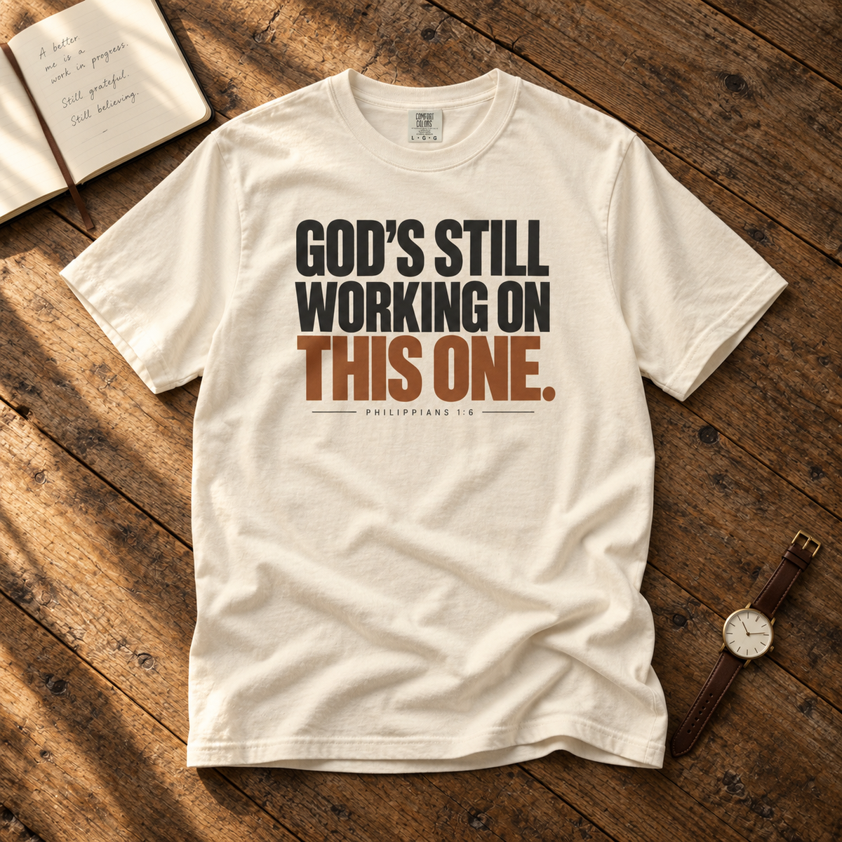 God’s Still Working Tee