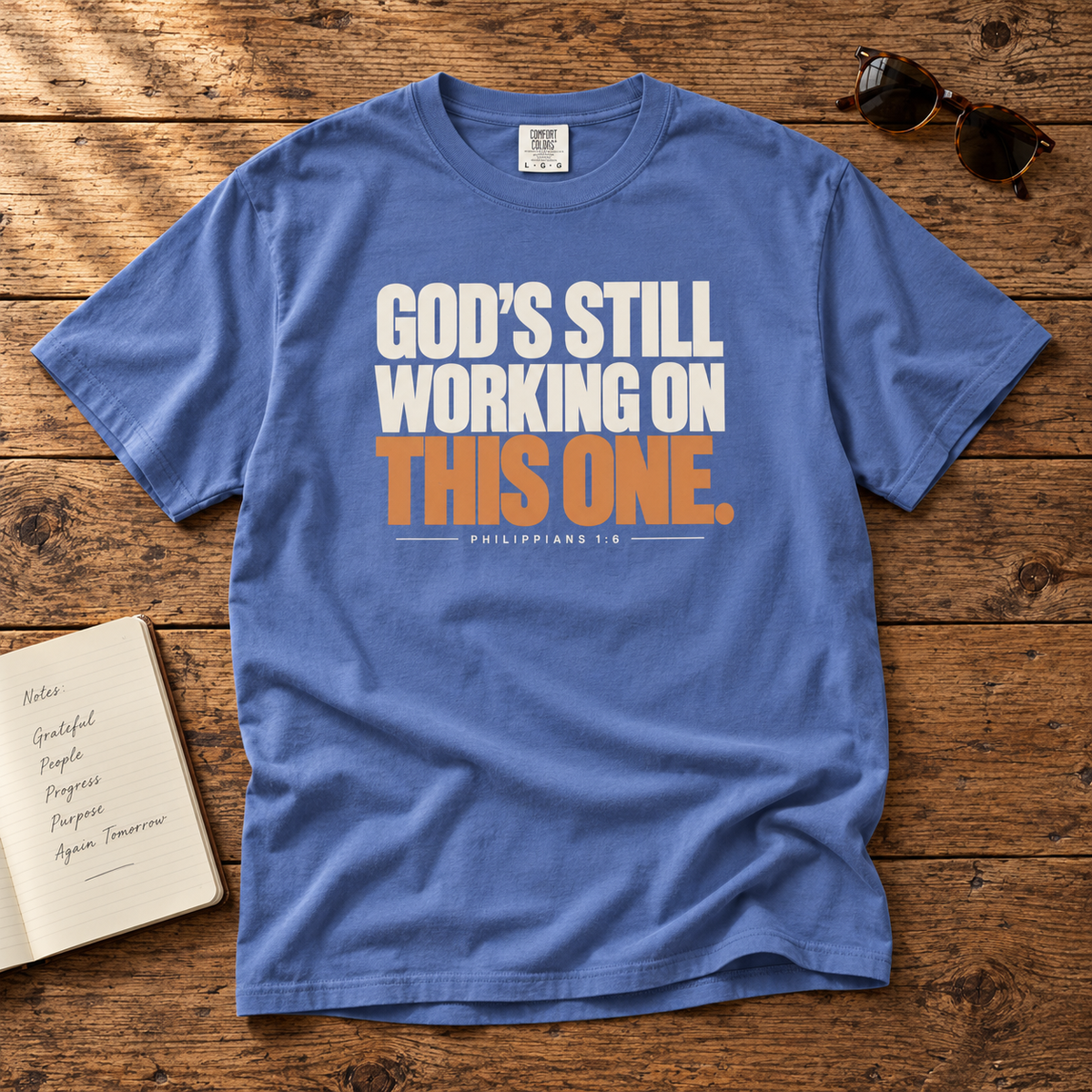 God’s Still Working Tee