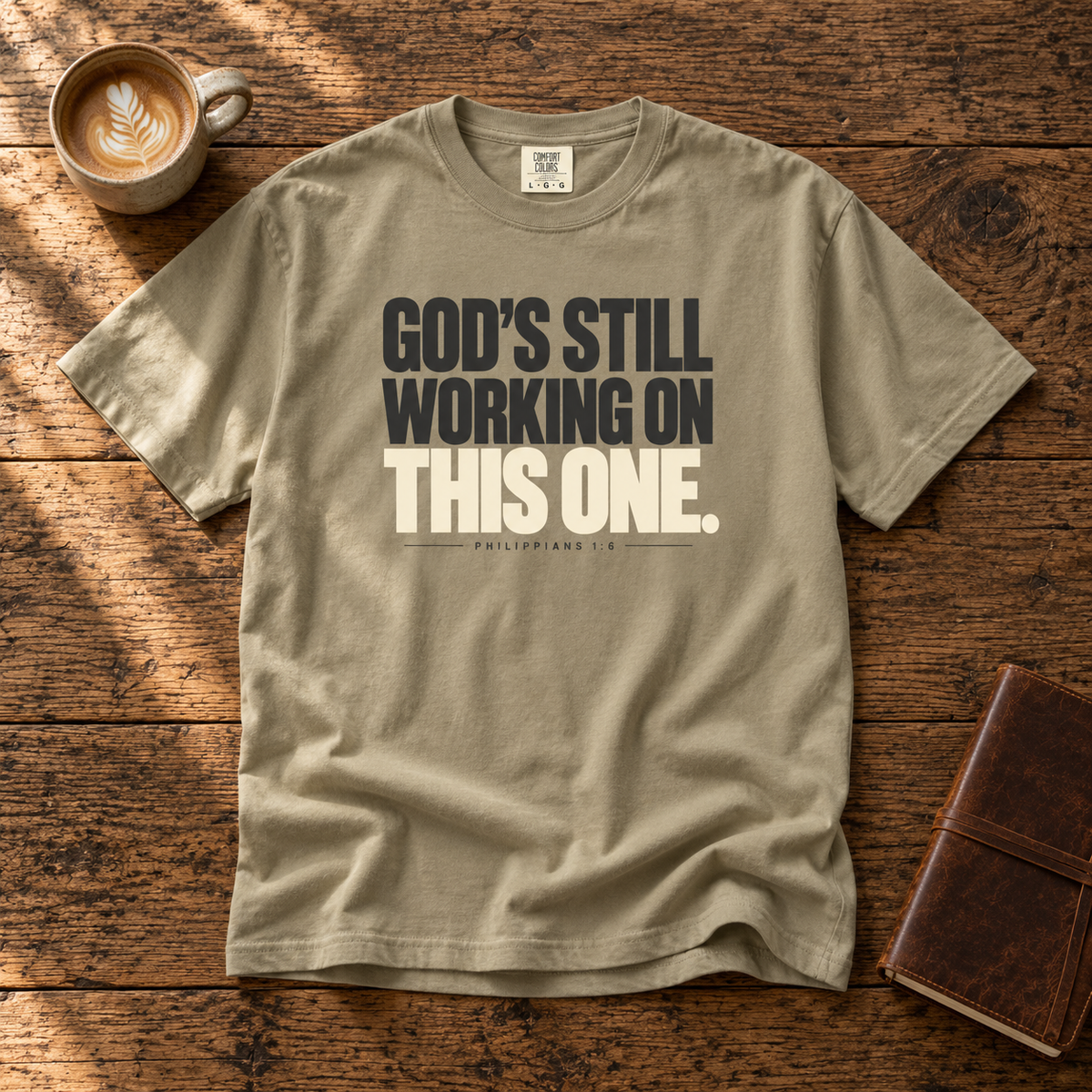 God’s Still Working Tee