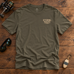 Do Not Disturb Army tee front with ETERNL WATERS chest logo on rustic wood