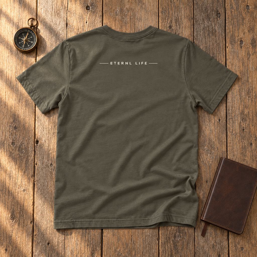FOUND. army tee back with ETERNL LIFE wordmark on rustic wood