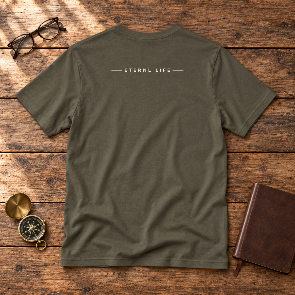 KNOWN. Army tee back with ETERNL LIFE wordmark on rustic wood