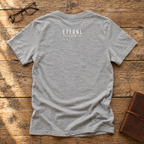 Women’s Called. Athletic Heather tee back on rustic wood